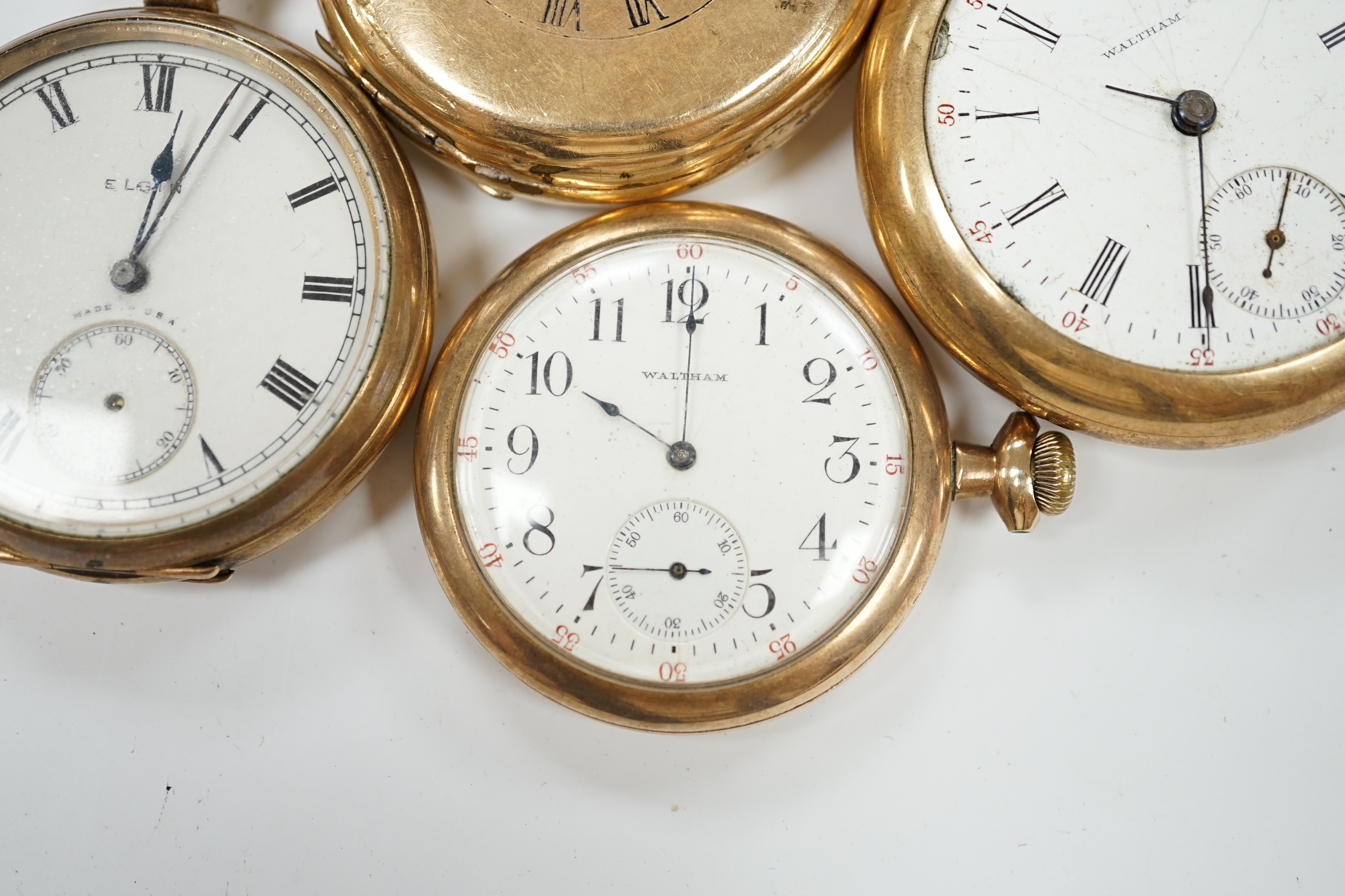 Four assorted gold plated pocket watches, including Elgin and half hunter.